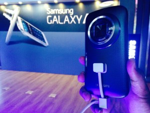 Like the Samsung Galaxy S4 Zoom, the new Galaxy K zoom is a hybrid device, fusing an LTE-capable Android 4.4  smartphone with the standard lens of a regular compact camera.  