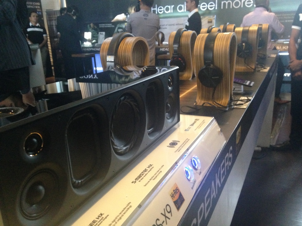 The SRS-X9 with Sony's latest headphones.
