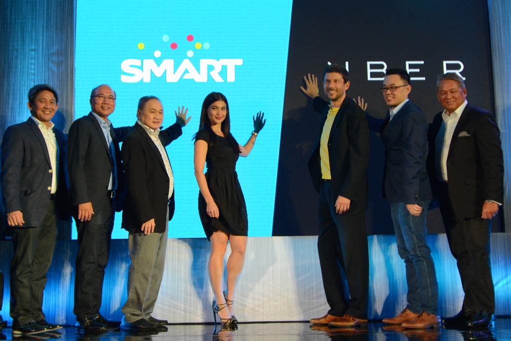 Users can now enjoy high-speed WiFi inside Uber cars powered by the country’s leader in mobile, while Smart subscribers who are first-time Uber users get a chance to get free rides. In photo are (from left) Ariel Fermin, EVP and Head of Consumer Business at PLDT and Smart; Orlando Vea, President at Voyager Innovations; Manuel V. Pangilinan, Chairman at PLDT and Smart; Smart celebrity endorser Anne Curtis; Mike Brown, Uber Regional Manager for Southeast Asia and Australia; Laurence Cua, Uber Country Manager for the Philippines; and Eric Alberto, EVP and Head of Enterprise Business at PLDT.